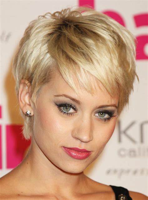 A short hairstyle, like a bob with side-swept bangs, helps reduce a large forehead while accentuating a sharp cheek and jawline. This thick hair chop works so well on rounder face shapes. Lots of layering and texturing bring out a movement that can create the best short hairstyles for thick hair and round face shapes.